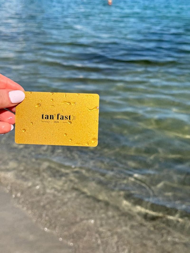 The Tan Fast Gold Card: a gold card printed with the tan fast logo